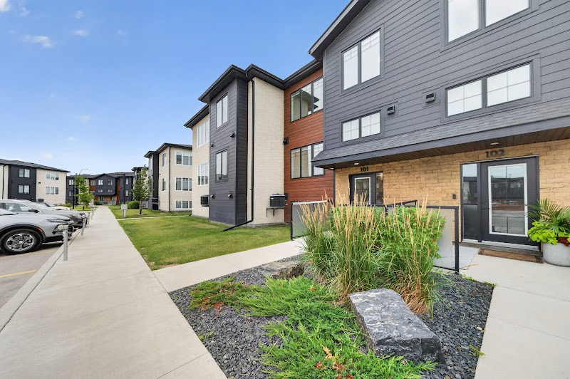The side of the building and the lawn