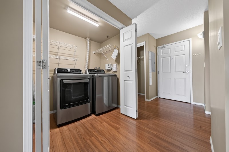The entry hall and in-suite laundry