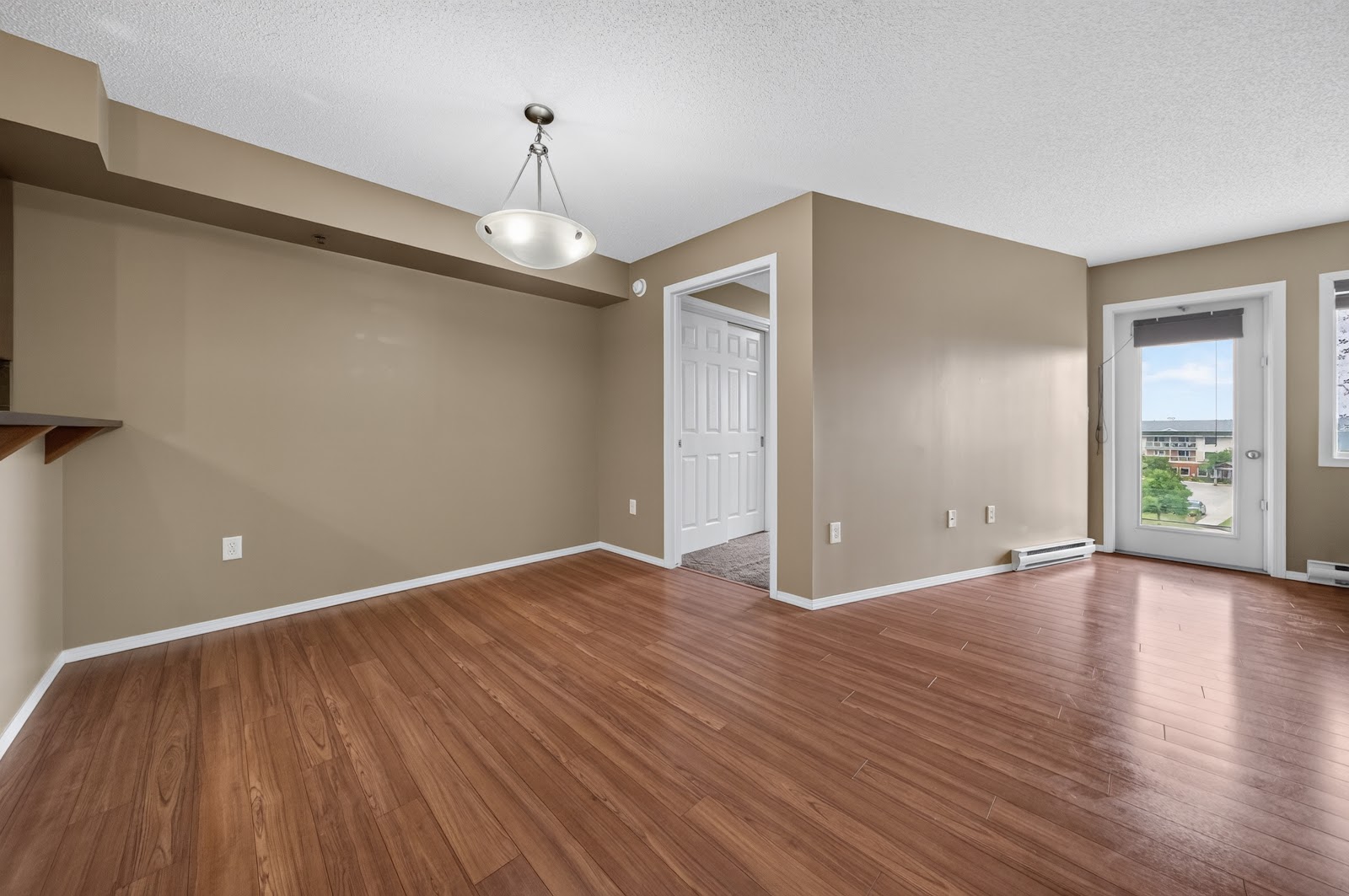 The living area and the balcony door