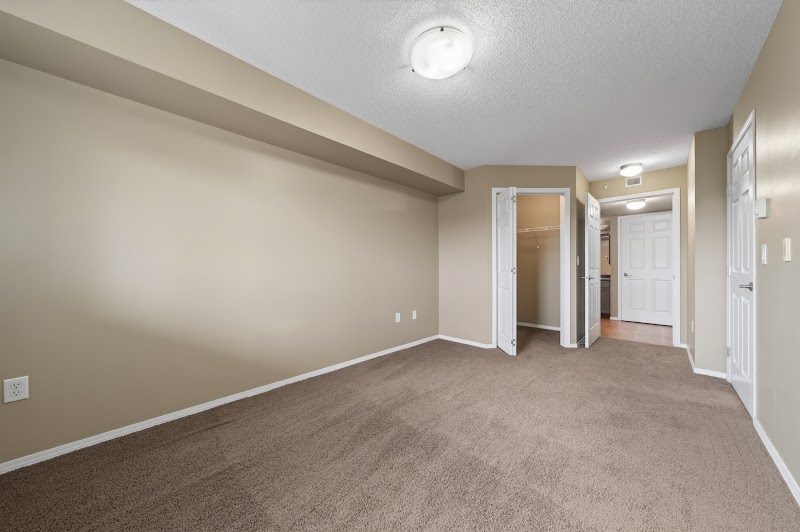 A carpeted bedroom