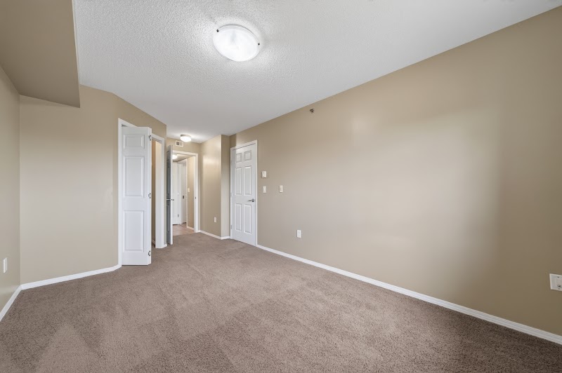 A carpeted bedroom