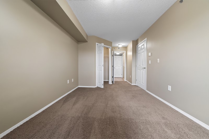 A carpeted bedroom