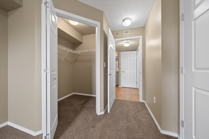 A carpeted bedroom