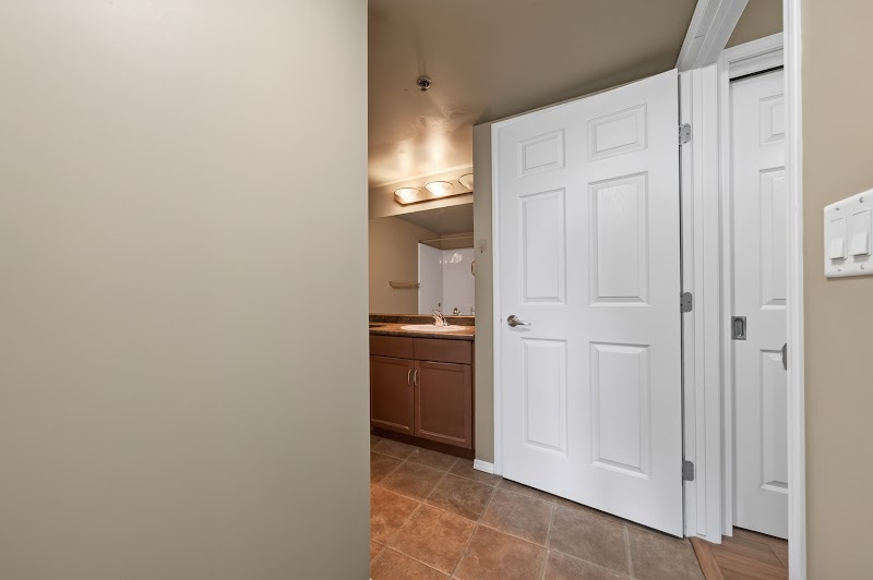 A carpeted bedroom