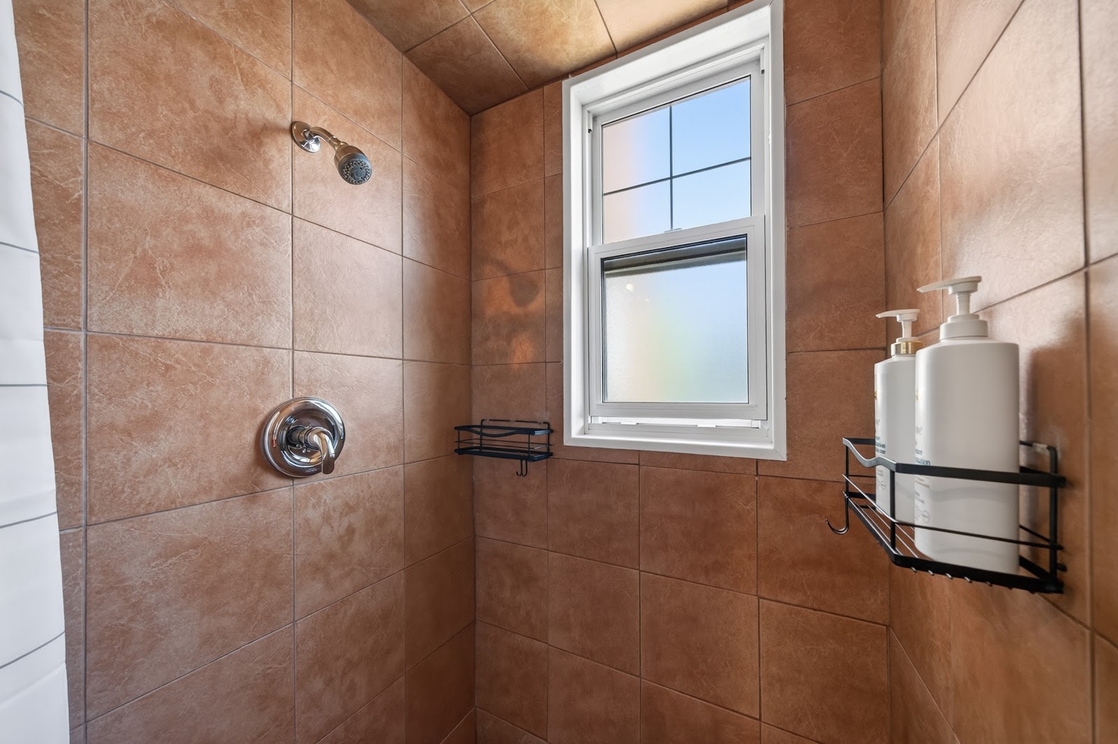 Tiled shower with window