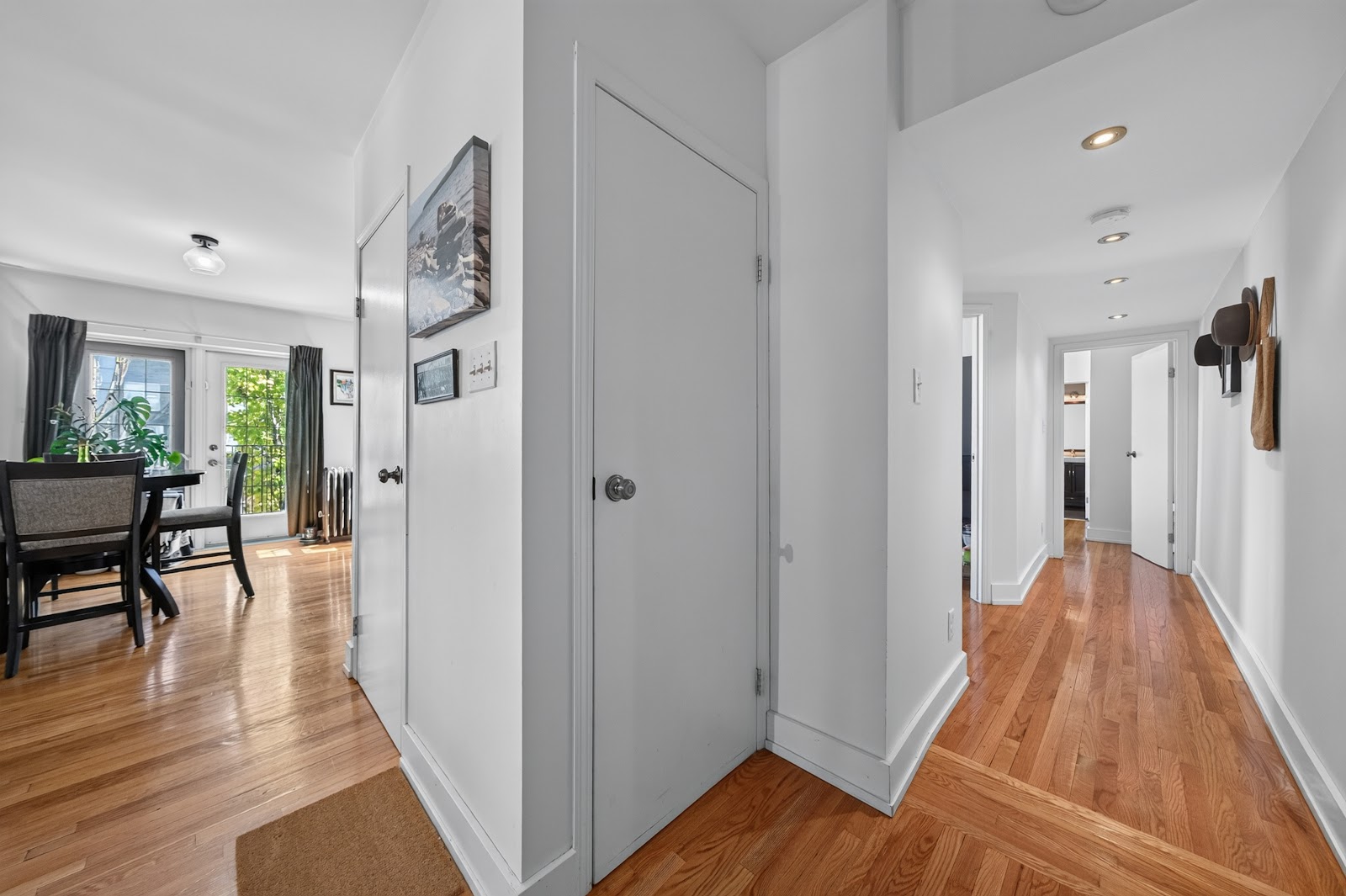 Hallway with hardwood floors