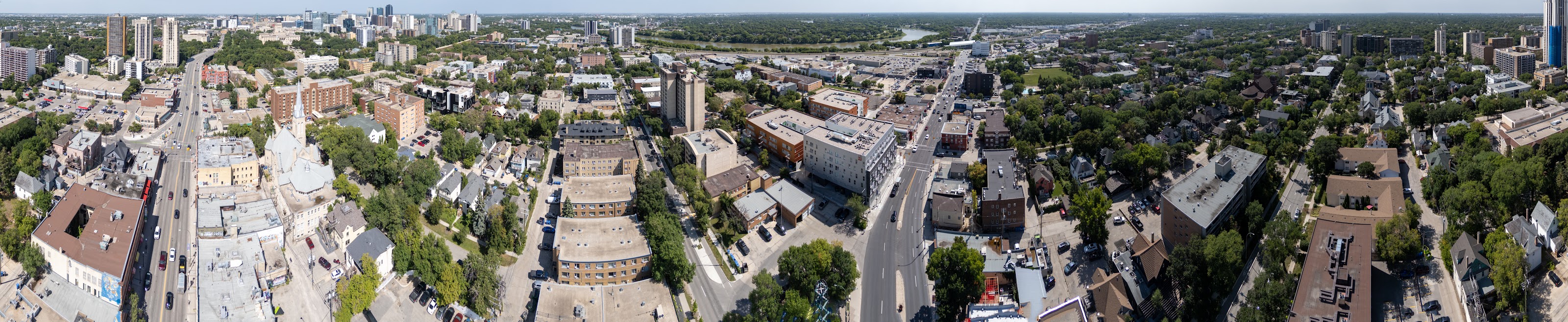 Aerial panorama across Osborne Village with 477 Wardlaw Avenue at centre